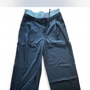 Fashion Nova black and white pinstripe boxer trousers